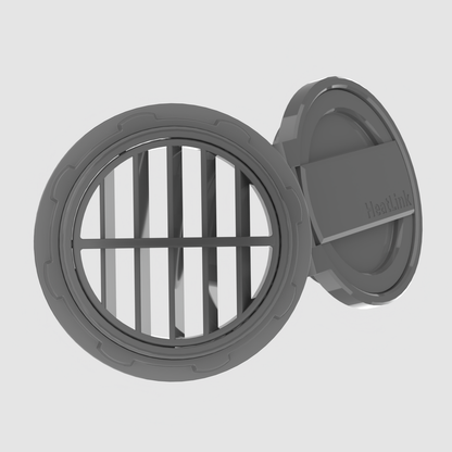 Close-up of HeatLink diesel heater port accessory vent insert with angled slats for directional warm air distribution.